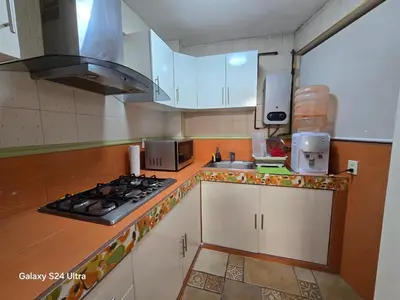 Una cocina o zona de cocina en Amplio apartamento sobre Avenida Viaducto