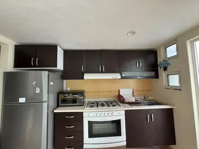 Una cocina o zona de cocina en Private House in Secure Complex with Pool & Lush Garden