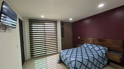 Cama o camas de una habitación en Departamento Céntrico Perote