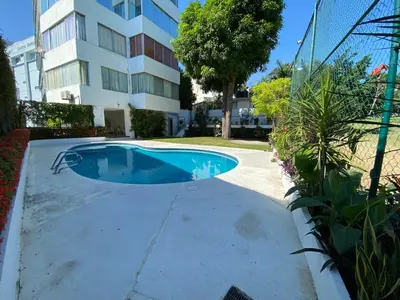 Piscina en o cerca de Departamento con vista al mar y campo de Golf