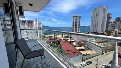 Un balcón o terraza de Departamento con vista al mar y campo de Golf