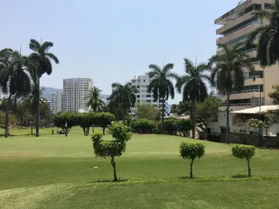 Jardín al aire libre en Departamento con vista al mar y campo de Golf
