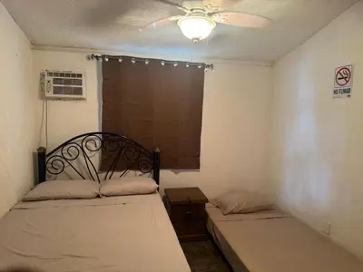 Cama o camas de una habitación en Un rincón cerca del sol