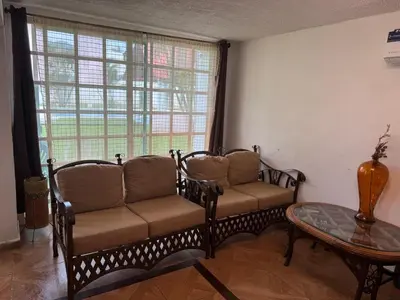 Zona de estar de Un rincón cerca del sol