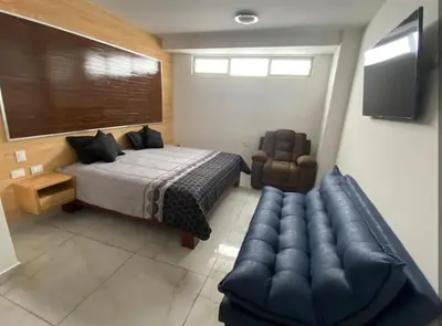 Cama o camas de una habitación en Edificio Confort