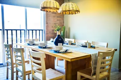 Un restaurante o sitio para comer en Departamento en Oaxaca para 18 personas - Con amenidades a 2,5km del centro