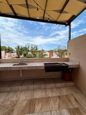 Un balcón o terraza de Casa con Alberca en condominio