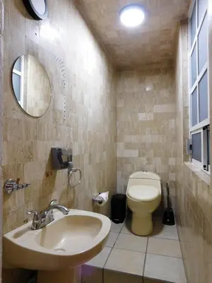 Un baño de Hospedaje GNP & Autódromo