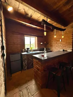 Una cocina o zona de cocina en Ecocabañas Aeropuerto