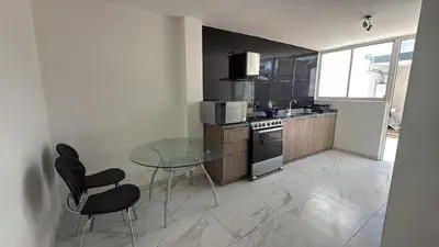 Una cocina o zona de cocina en Trapp House By Casa Palmera