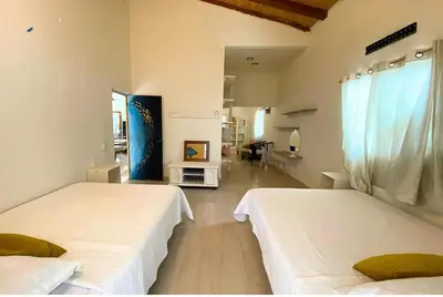 Cama o camas de una habitación en Nour Huatulco