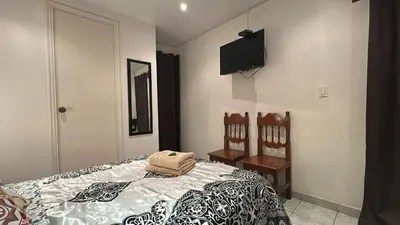 Cama o camas de una habitación en Habitación a 5 minutos del AICM