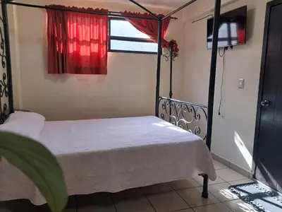 Cama o camas de una habitación en Hotel Antigua Encomienda