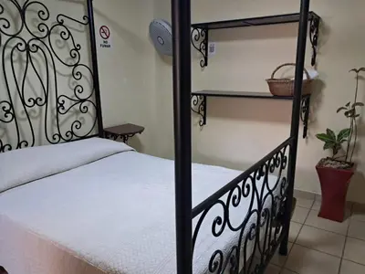 Cama o camas de una habitación en Hotel Antigua Encomienda