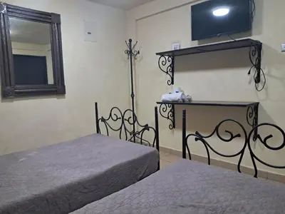 Cama o camas de una habitación en Hotel Antigua Encomienda