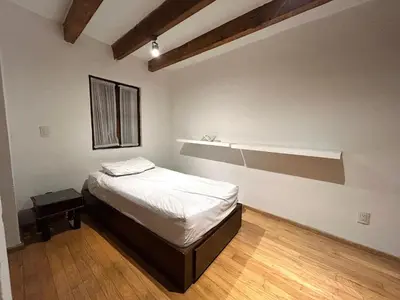 Cama o camas de una habitación en Casa tradicional en Coyoacán