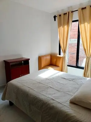 Cama o camas de una habitación en Spacious and private apartment