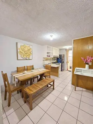 Una cocina o zona de cocina en Departamento Céntrico en Huatulco climatizado