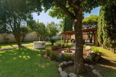 Jardín al aire libre en Sólo para ti, jacuzzi, gran jardín, fogata y palapa