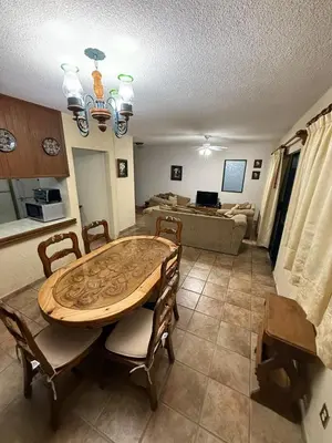 Zona de estar de Casa La Cañada216 con Alberca Climatizada