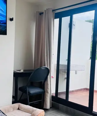 Una televisión o centro de entretenimiento en Loft con terraza privada en CDMX