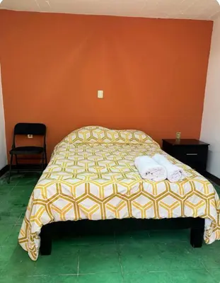 Cama o camas de una habitación en Casa tulipán