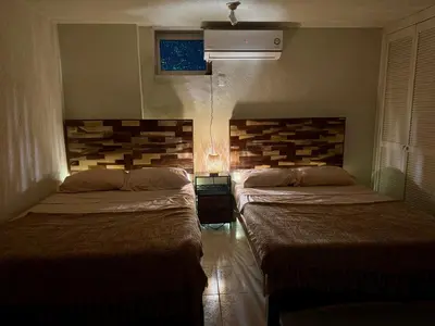 Cama o camas de una habitación en Hermoso departamento en condominio de Costa Azul
