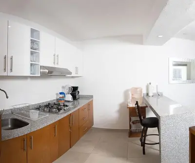 Una cocina o zona de cocina en Padrísimo apartamento frente al mar