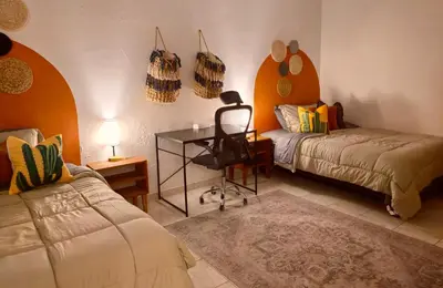 Cama o camas de una habitación en Casa completa en Jalatlaco con cocina equipada y parking hasta 7 huéspedes