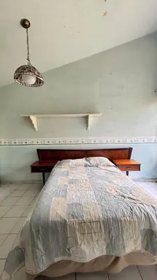 Cama o camas de una habitación en casa en cuernavaca