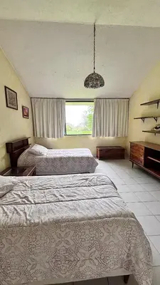 Cama o camas de una habitación en casa en cuernavaca