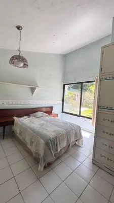 Cama o camas de una habitación en casa en cuernavaca