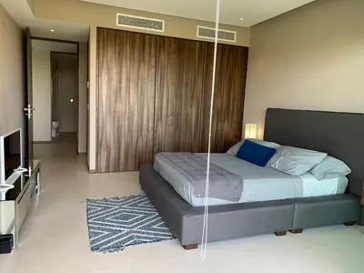 Una televisión o centro de entretenimiento en Departamento en Playa en La Isla Residences Acapulco