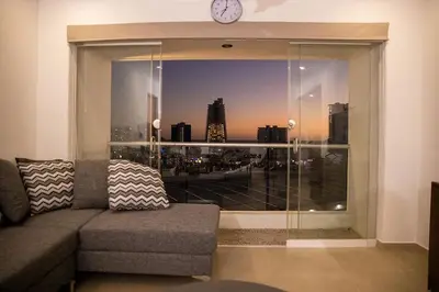 Zona de estar de Padrísimo apartamento frente al mar