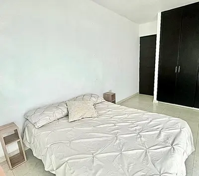 Cama o camas de una habitación en Casa MODERNA MALECON PLAYA