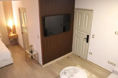 Una televisión o centro de entretenimiento en Loft de ensueño en el corazón de Val'Quirico