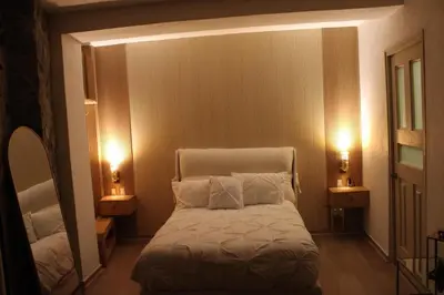 Cama o camas de una habitación en Loft de ensueño en el corazón de Val'Quirico