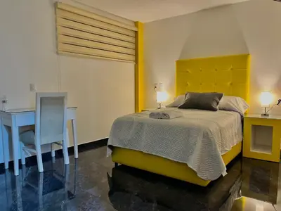 Cama o camas de una habitación en Mi bello Zacatlán-Loft Manzana Rayada