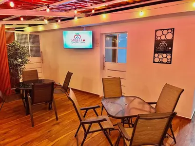 Una televisión o centro de entretenimiento en Mi bello Zacatlán-Suite Manzana Peruana
