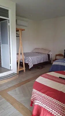 Cama o camas de una habitación en Hotel-Jardín Bella Oaxaca