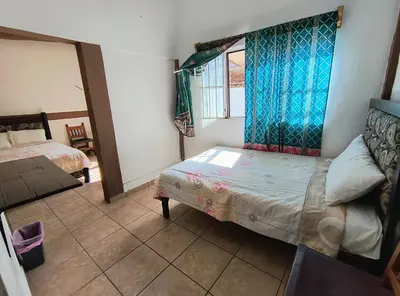 Cama o camas de una habitación en Casa del Patrón Posada