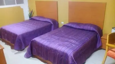 Cama o camas de una habitación en Hotel Mosjer