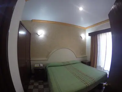 Cama o camas de una habitación en Hotel Rivera