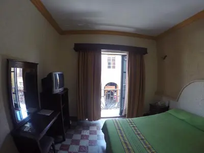 Cama o camas de una habitación en Hotel Rivera