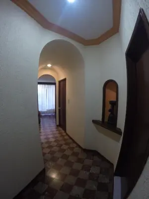 Una televisión o centro de entretenimiento en Hotel Rivera