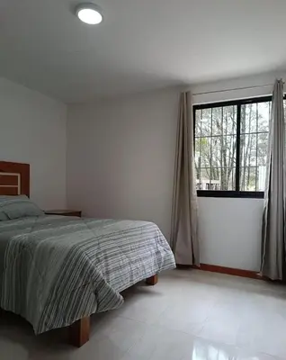 Cama o camas de una habitación en Cabañas El Rincón de los Sueños
