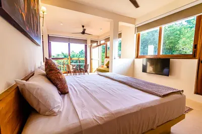 Cama o camas de una habitación en Ocean Views Amazing Rooftop