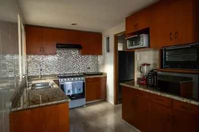 Una cocina o zona de cocina en Villa 25 Piedra Fina