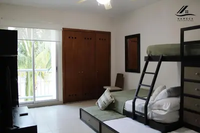 Cama o camas de una habitación en Departamento en Acapulco Diamante