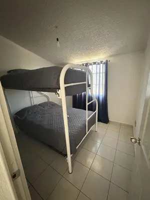 Cama o camas de una habitación en Casa en Acapulco diamante